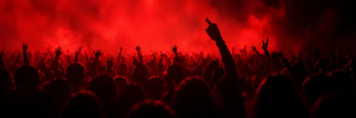 AFROLAND UNRATED crowd moving together under red event lights